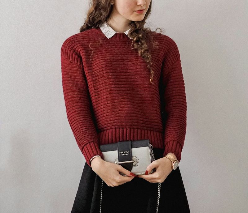 Sweter z warkoczem